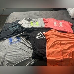 Lot of Under armour and adidas shirts
